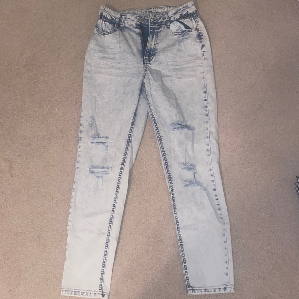 WORN ONCE: Light denim ripped jeans.